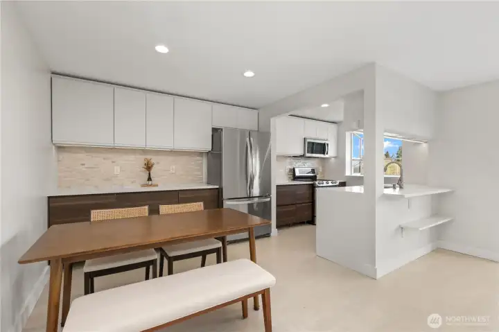 Kitchen with Eating Area and Breakfast Bar.