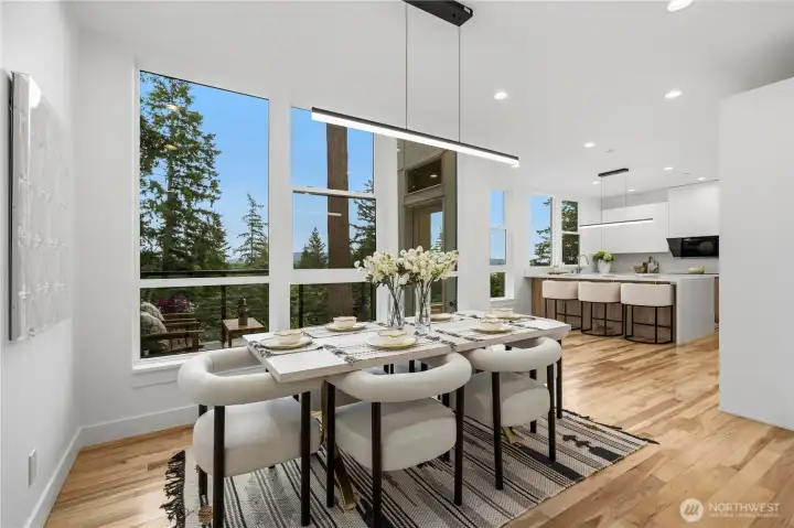 The dining is seamlessly connected to the chef's kitchen