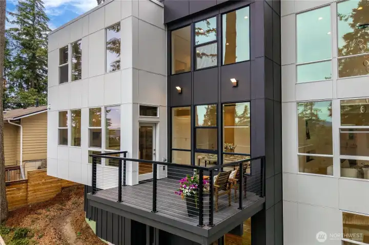 A view deck can be accessed through the dining and kitchen area