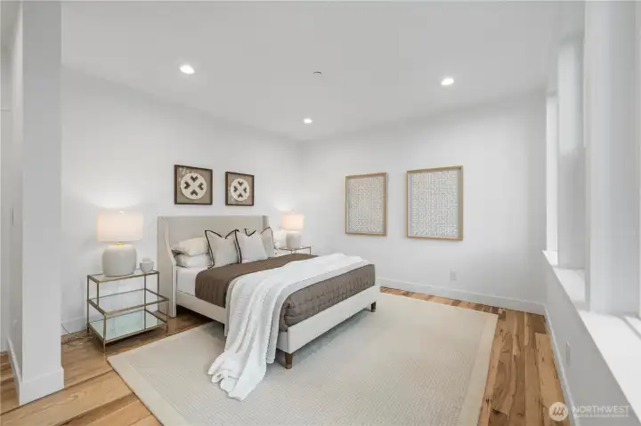 Retreat to the luxurious primary suite, thoughtfully designed as a private sanctuary
