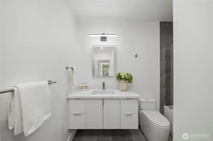 3rd bathroom upstairs with a full bath