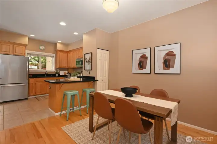 The eating bar can also double as a serving buffet. Shown is a 48" table, this area could easily accommodate a larger table for six.