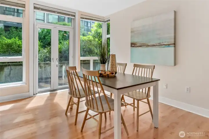 Nice sized dining area, with double-door access to patio for easy outdoor/indoor entertaining. NOTE: due to scaffolding, NO patio use during construction. Nice sized dining area, with double-door access to patio for easy outdoor/indoor entertaining. NOTE: due to scaffolding, NO patio use during construction.