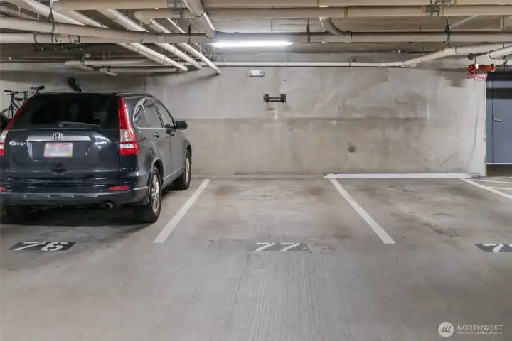 #105 has parking space #77, with wall-mounted bike rack. Just a few steps from elevator. #105 has parking space #77, with wall-mounted bike rack. Just a few steps from elevator.