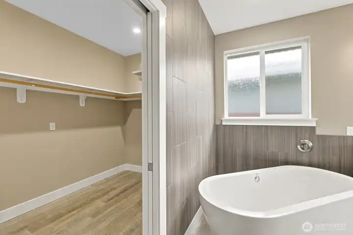 Soaking Tub looking into Primary Walk-In Closet Soaking Tub looking into Primary Walk-In Closet