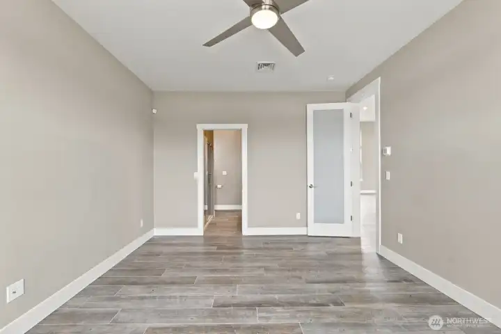 2nd Primary/Bedroom leading into the Custom Bathroom, and Walk-In Closet 2nd Primary/Bedroom leading into the Custom Bathroom, and Walk-In Closet