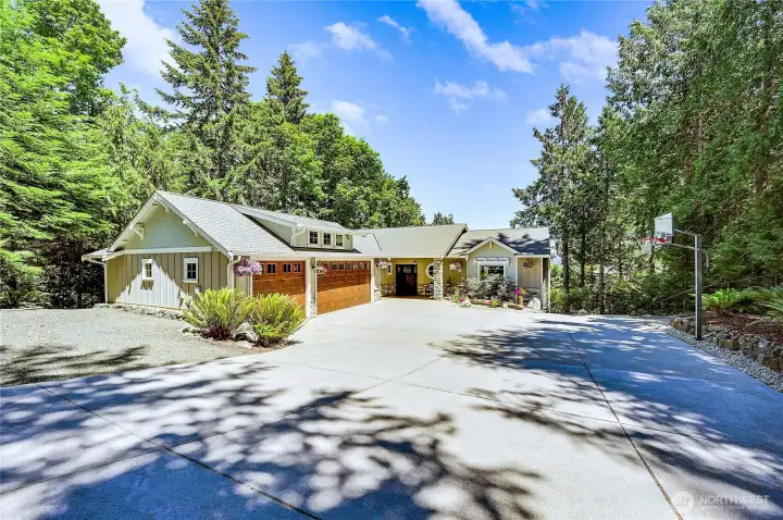 You will love the abundant off street parking, three car garage with extra tall 9ft doors.