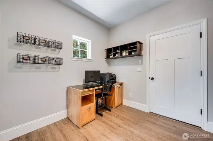The office is accessible from the primary suite or entry hallway.