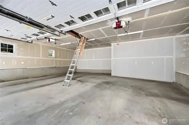 This is the three-car garage, and the ladder goes to big storage area.