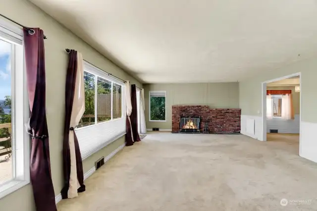 Large Living room with brick fireplace.