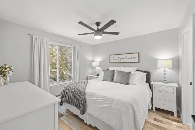 Primary bedroom with new ceiling fan