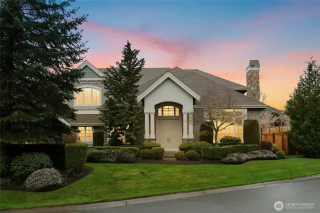 Beautiful John Buchan built home on meticulously landscaped corner lot in Blackstone.