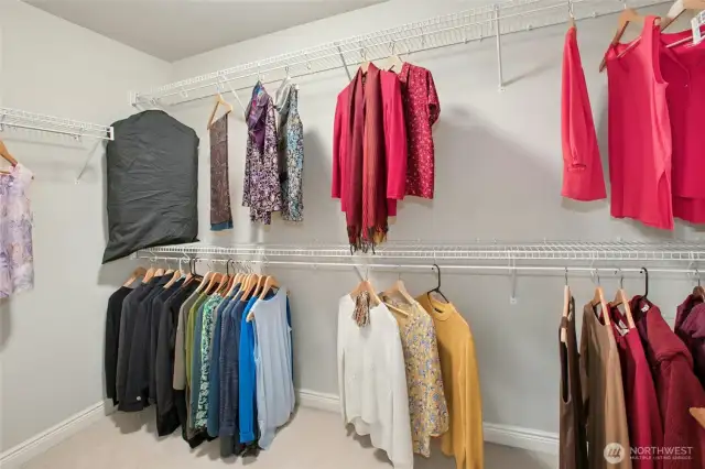 One of two walk-in closets in the primary bedroom.