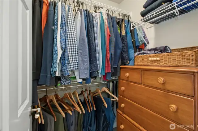 Second walk-in closet in primary bedroom.