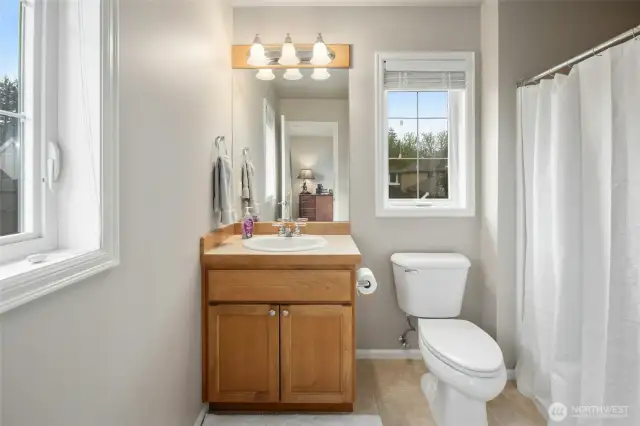Full ensuite bath for the upper level guest suite.