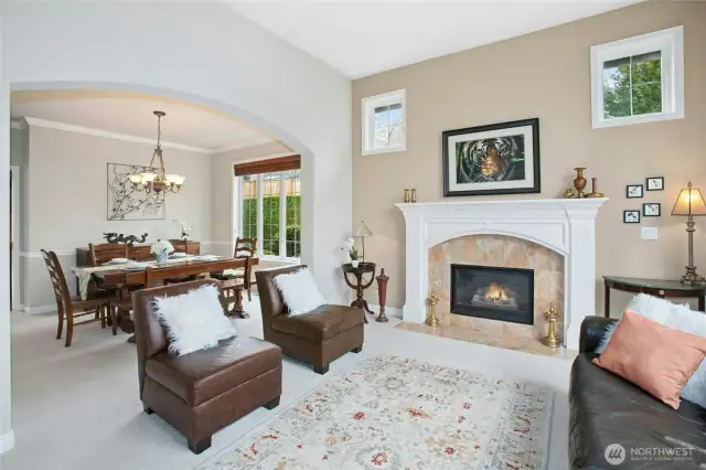 Living room showing adjacent formal dining room.