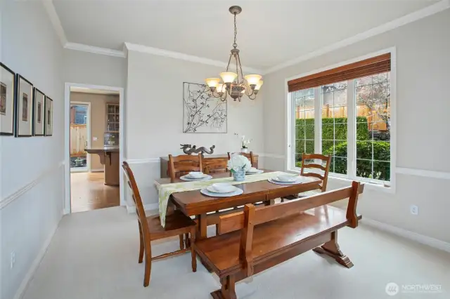 The formal dining room is adjacent to the kitchen and living room.