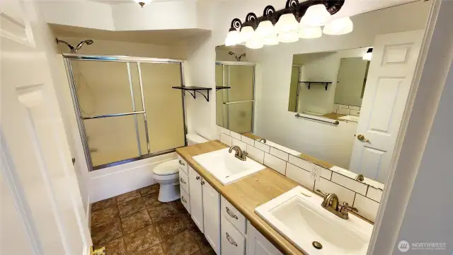 Lower level full Bathroom with dual vanity.