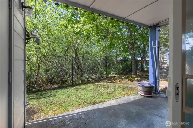 Patio with view of back greenbelt with pond that is full of small animal life!