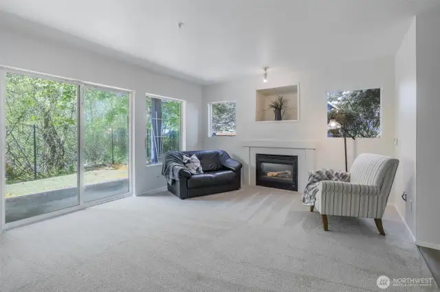 Living room with gas fireplace.