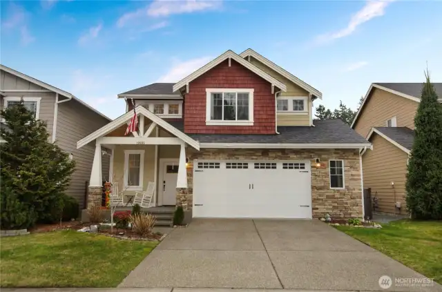 Large 2+ car garage with large storage space.