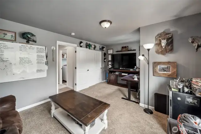 Call it a LARGE bonus room, bedroom #5,  play area, home theatre....either way its a  great flex space.
