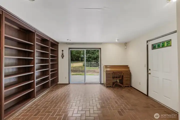 Family room/library/bonus room opens to backyard.