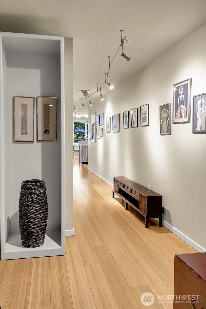 Welcome home to unit 324- the largest home in the building! Pretty gallery ushers one into the home.