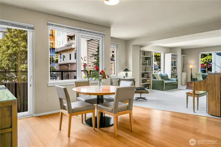 The dining room is adjacent to both the living room and a wonderful deck. The door is to the left in this picture.