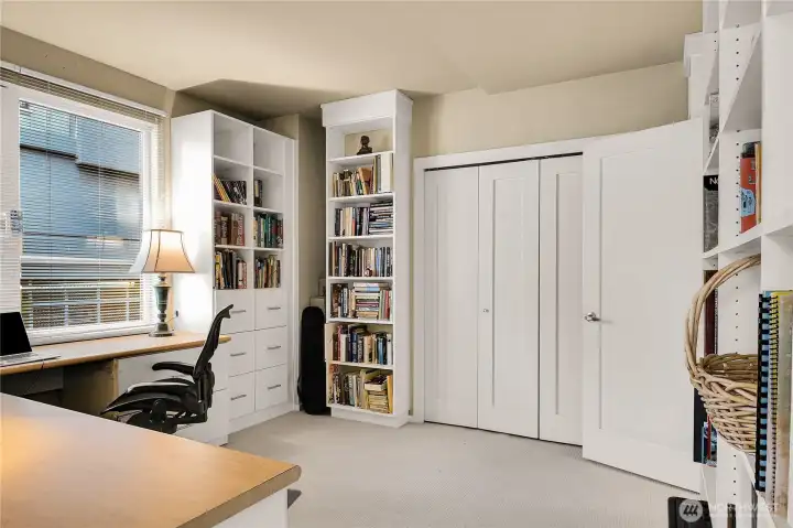 Here is the second bedroom, which is currently being used as an office.  Tons of storage and lots of bookcases in here.