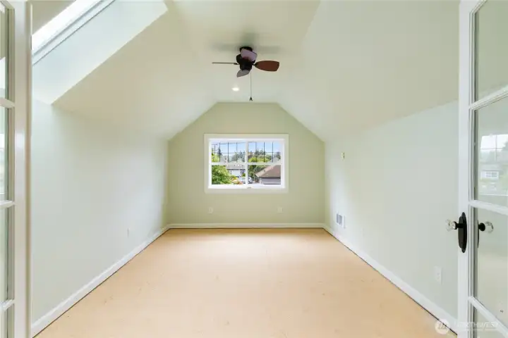 2nd floor perfect room for crafts, office or play room. Skylight adds to this room light & bright feeling. All it needs is flooring to complete this perfect space.