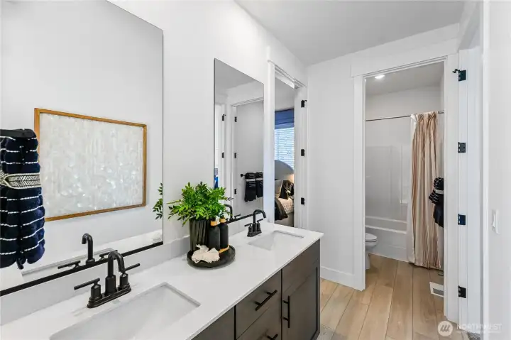 Staged photos are of model home