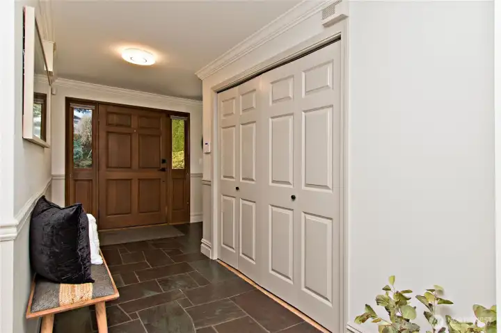 Spacious entry allows for guest seating or display.