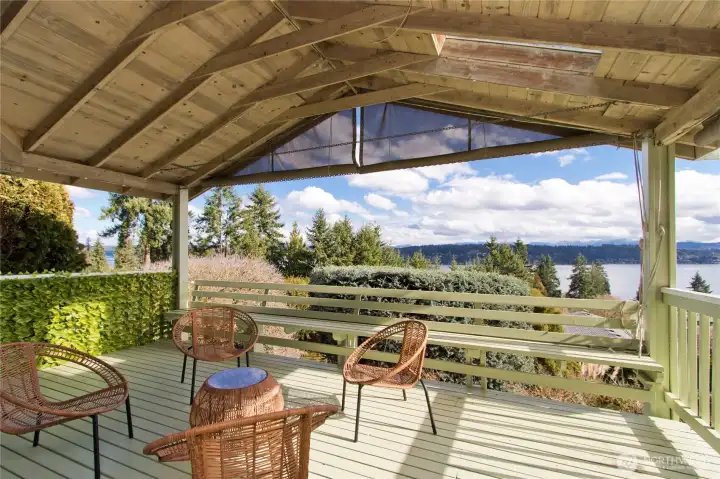 Relax or entertain in style from this covered deck that extends your outdoor living.