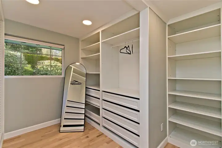 Primary walk-in closet with built-ins.
