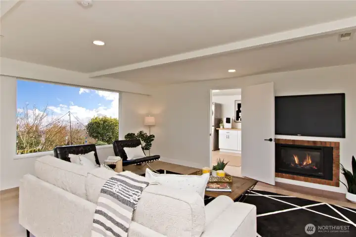 A fireplace in the family room invites relaxation.