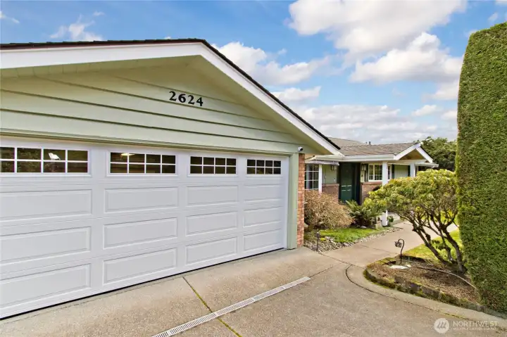 A spacious 2-car garage adds convenience.