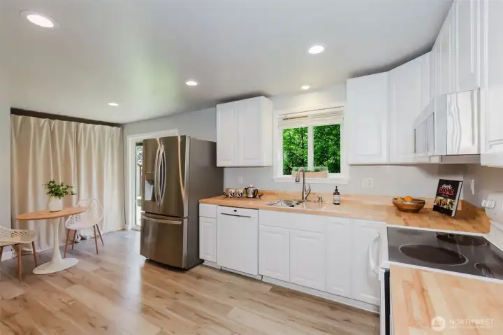New butcher block countertops, sink and dishwasher