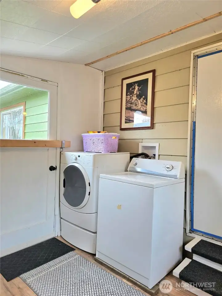 Utility off kitchen.