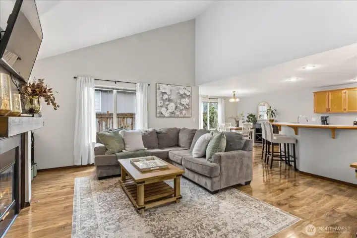 Open concept living on the lower level with laminate floors throughout.