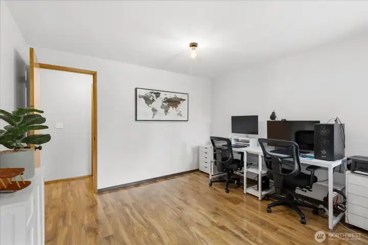 Main level room has many possibilities. Great home office, main floor bedroom or flex space.