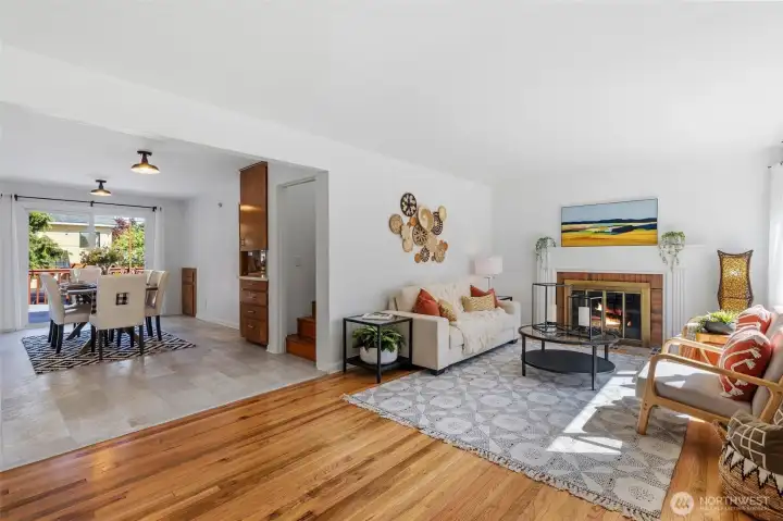 Living Room & Dining Room.  Wood burning fireplace.