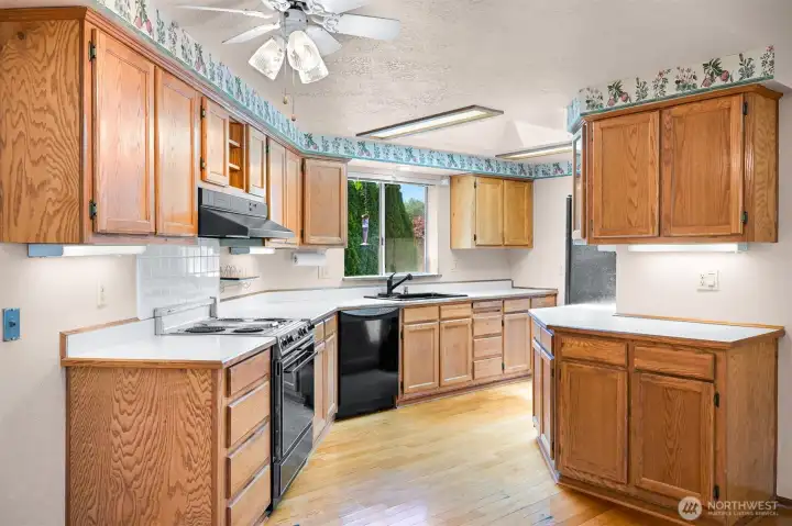 Kitchen with abundant storage.