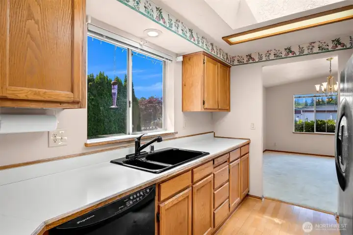 Kitchen with so much bright light and storage