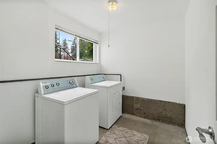 Dedicated laundry room downstairs