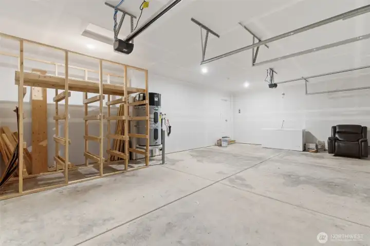 Large 3-car garage with built in storage space.