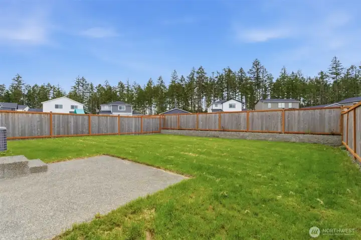 Backyard is level with a lot of room