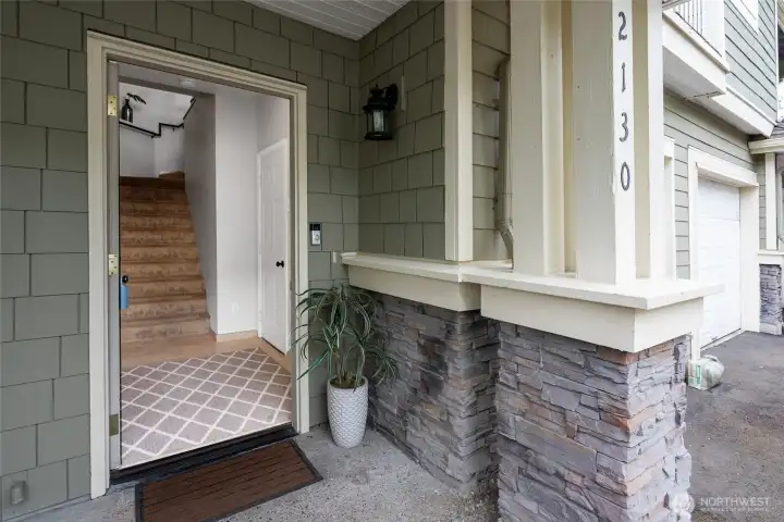 Main entrance - the door to the right is to your garage.