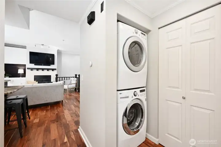 In unit full-size laundry and additional closet storage.