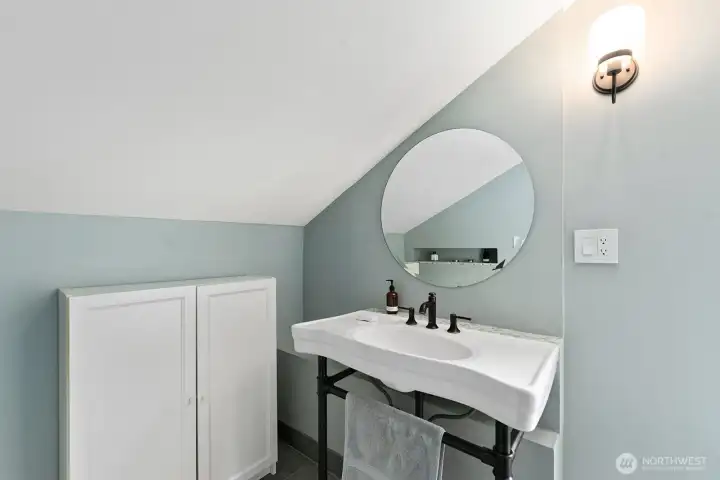 Vanity in primary suite bathroom.